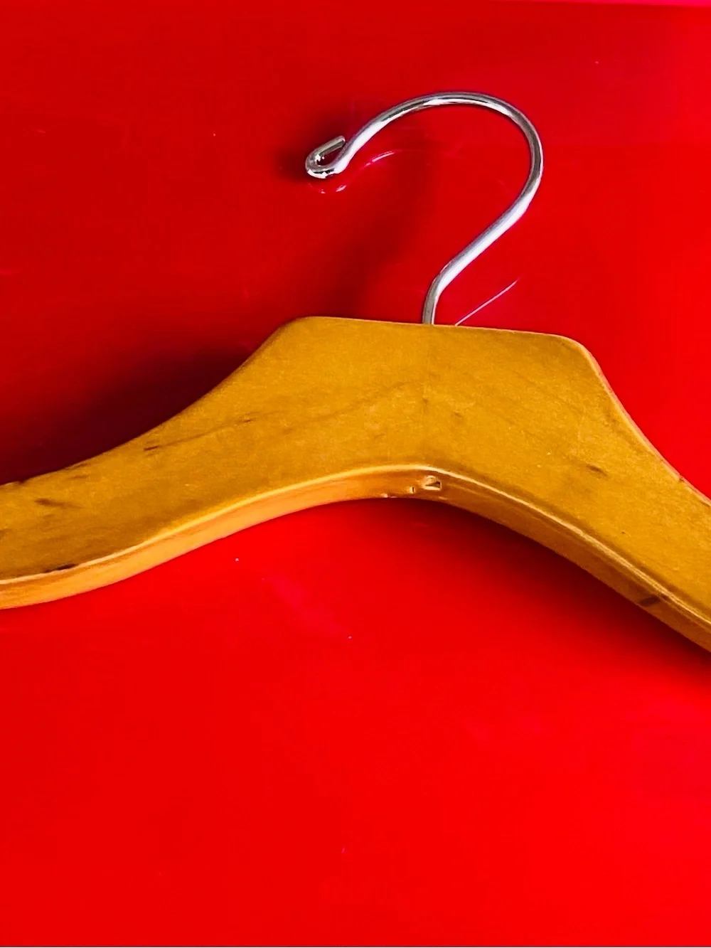bebe Wooden Clothing Hanger in Yellow with Metal Hook
